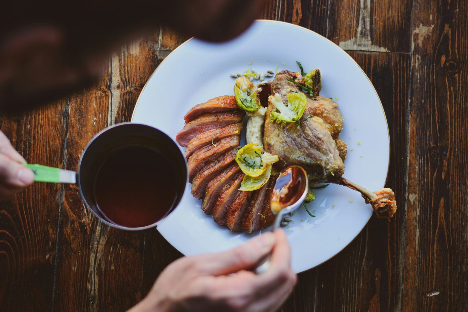 a plate of food and a cup of coffee